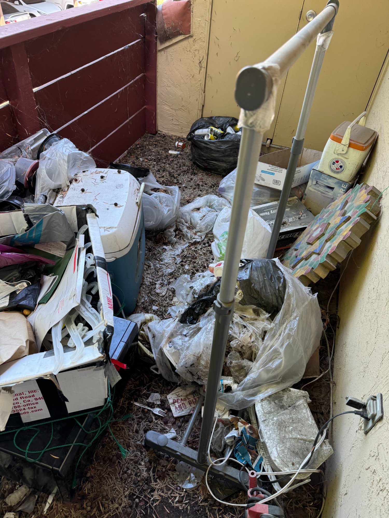 Before: Balcony — Pack Rat Condo, Fremont CA